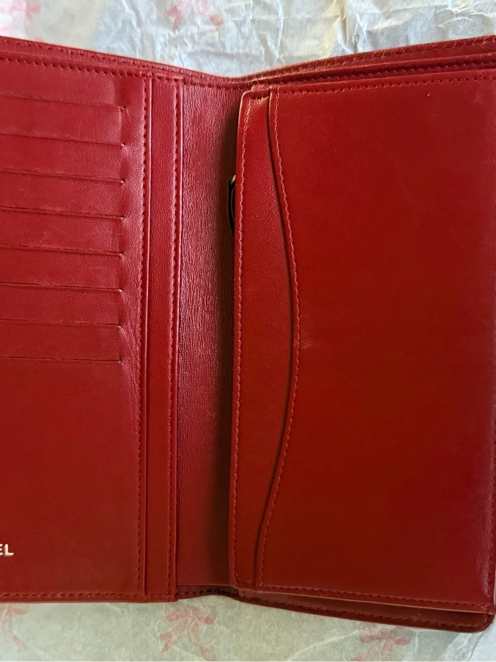 Authentic CHANEL Quilted Red Lambskin Leather Long Wallet with Silver CC Emblem.